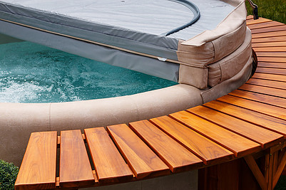 hot tub with wood deck